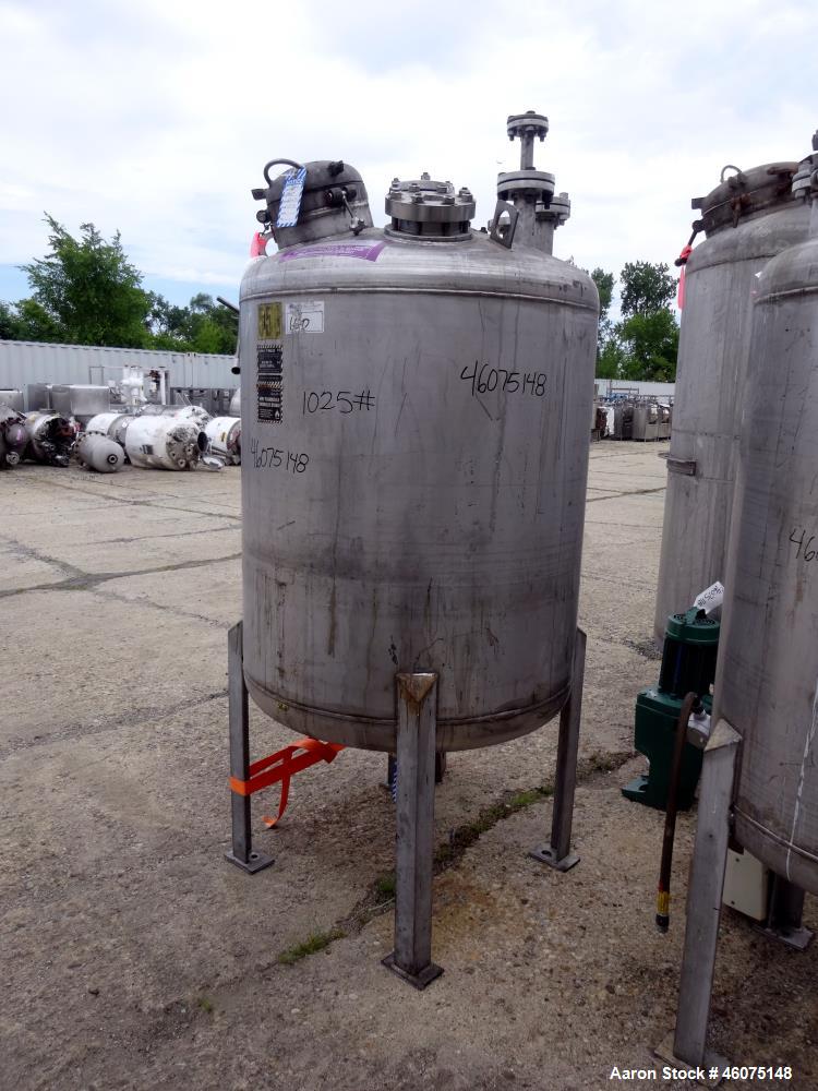 Used Tank, 275 Gallon, 316 Stainless Steel, Vertical. Approximate 42" diameter x 43" straight side, dished top & bottom. Off center top entering Lightnin agitator, model EKXJC-65, serial# 93/B35821-0...
