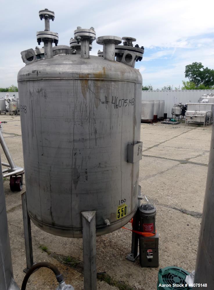 Used Tank, 275 Gallon, 316 Stainless Steel, Vertical. Approximate 42" diameter x 43" straight side, dished top & bottom. Off center top entering Lightnin agitator, model EKXJC-65, serial# 93/B35821-0...