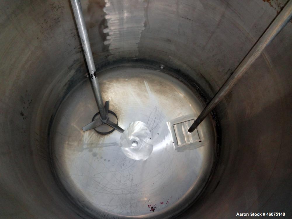 Used Tank, 275 Gallon, 316 Stainless Steel, Vertical. Approximate 42" diameter x 43" straight side, dished top & bottom. Off center top entering Lightnin agitator, model EKXJC-65, serial# 93/B35821-0...