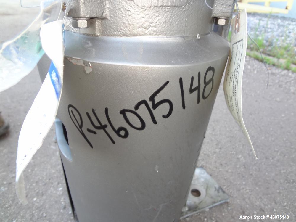 Used Tank, 275 Gallon, 316 Stainless Steel, Vertical. Approximate 42" diameter x 43" straight side, dished top & bottom. Off center top entering Lightnin agitator, model EKXJC-65, serial# 93/B35821-0...