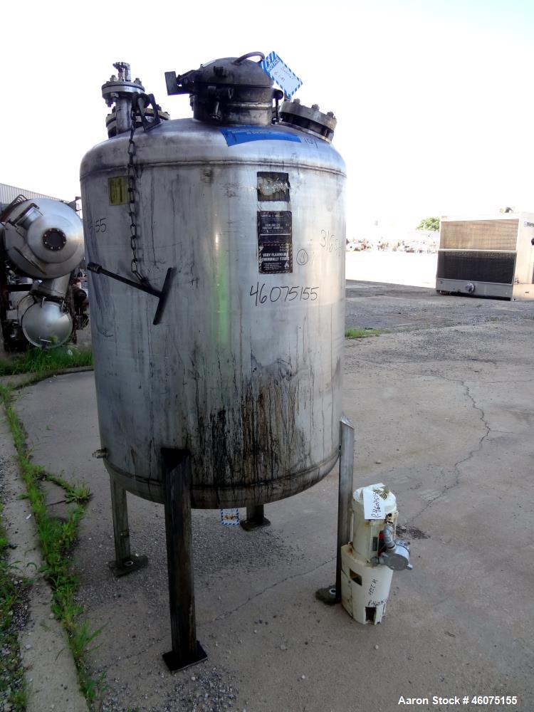 Used Tank, 275 Gallon, 304 Stainless Steel, Vertical. Approximate 42" diameter x 43" straight side, dished top & bottom. Off center top entering Lightnin agitator, model EKXJC-43, serial# 93/B35827-3...