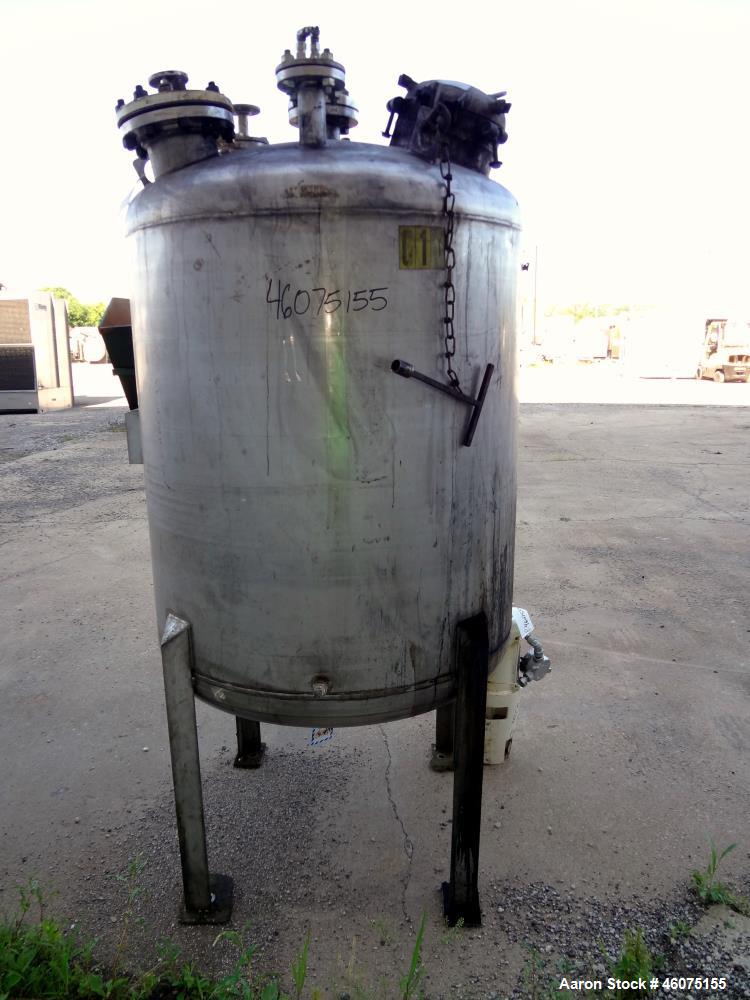 Used Tank, 275 Gallon, 304 Stainless Steel, Vertical. Approximate 42" diameter x 43" straight side, dished top & bottom. Off center top entering Lightnin agitator, model EKXJC-43, serial# 93/B35827-3...