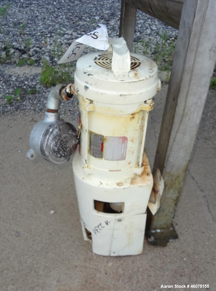 Used Tank, 275 Gallon, 304 Stainless Steel, Vertical. Approximate 42" diameter x 43" straight side, dished top & bottom. Off center top entering Lightnin agitator, model EKXJC-43, serial# 93/B35827-3...