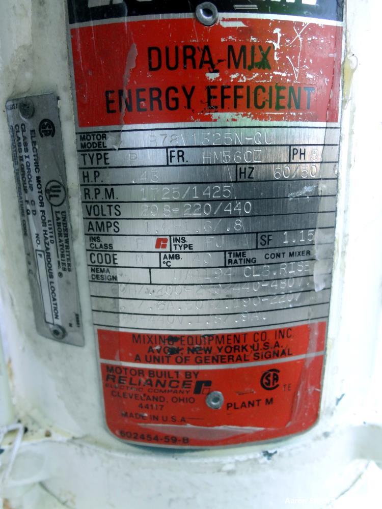 Used Tank, 275 Gallon, 304 Stainless Steel, Vertical. Approximate 42" diameter x 43" straight side, dished top & bottom. Off center top entering Lightnin agitator, model EKXJC-43, serial# 93/B35827-3...