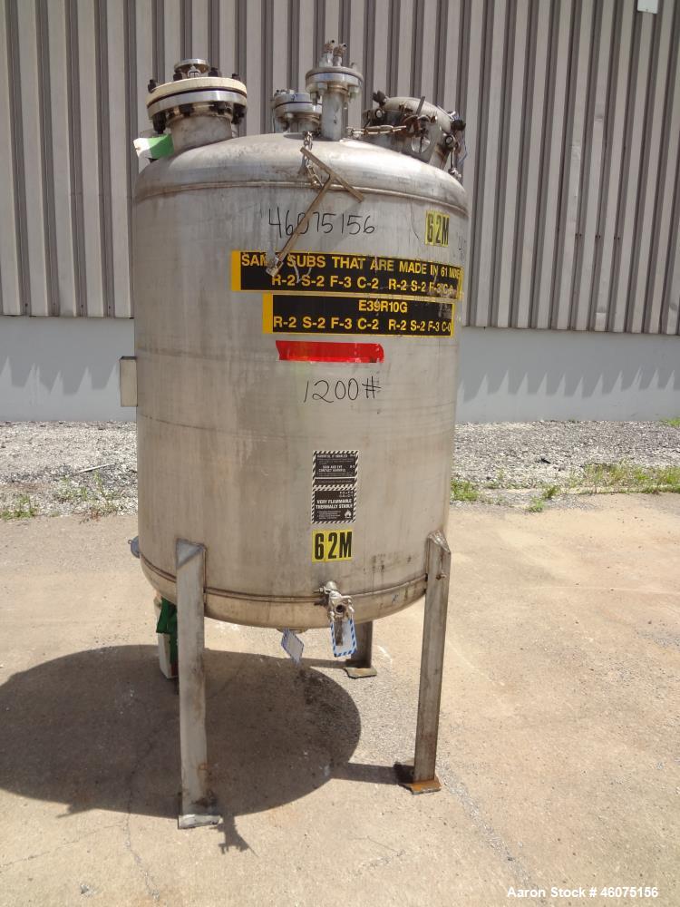 Used Tank, 275 Gallon, 316 Stainless Steel, Vertical. Approximate 42" diameter x 43" straight side, dished top & bottom. Off center top entering Lightnin agitator, model EKXJC-43, serial# 93/B35827-1...
