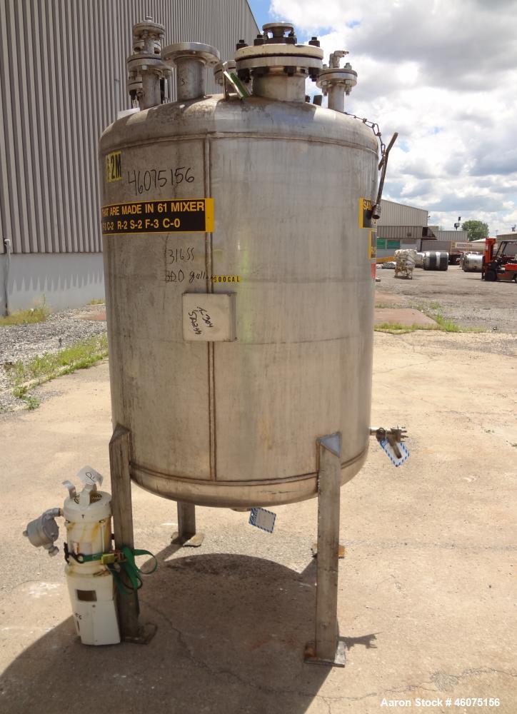 Used Tank, 275 Gallon, 316 Stainless Steel, Vertical. Approximate 42" diameter x 43" straight side, dished top & bottom. Off center top entering Lightnin agitator, model EKXJC-43, serial# 93/B35827-1...