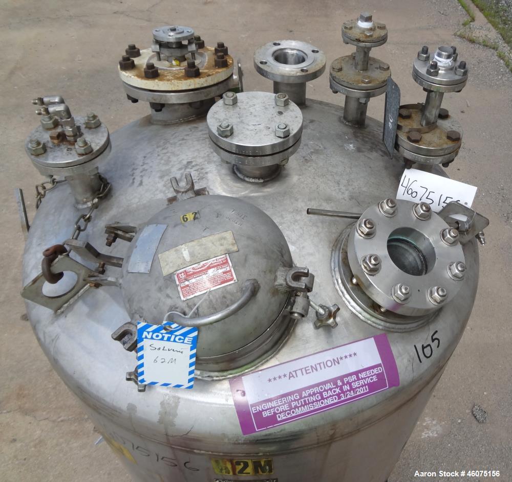 Used Tank, 275 Gallon, 316 Stainless Steel, Vertical. Approximate 42" diameter x 43" straight side, dished top & bottom. Off center top entering Lightnin agitator, model EKXJC-43, serial# 93/B35827-1...