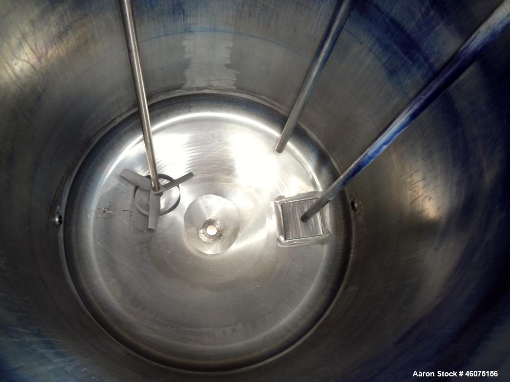 Used Tank, 275 Gallon, 316 Stainless Steel, Vertical. Approximate 42" diameter x 43" straight side, dished top & bottom. Off center top entering Lightnin agitator, model EKXJC-43, serial# 93/B35827-1...