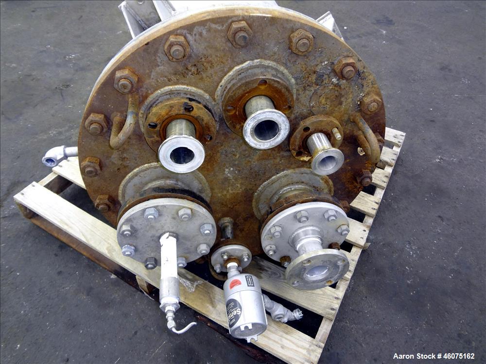 Used Tank, 50 Gallon, 304 Stainless Steel, Vertical. Approximate 24" diameter x 24" straight side, flat bolt top, dished bottom. Top openings: (2) 2", (2) 4", (1) 1-1/2", (1) 1". 3" Center bottom out...