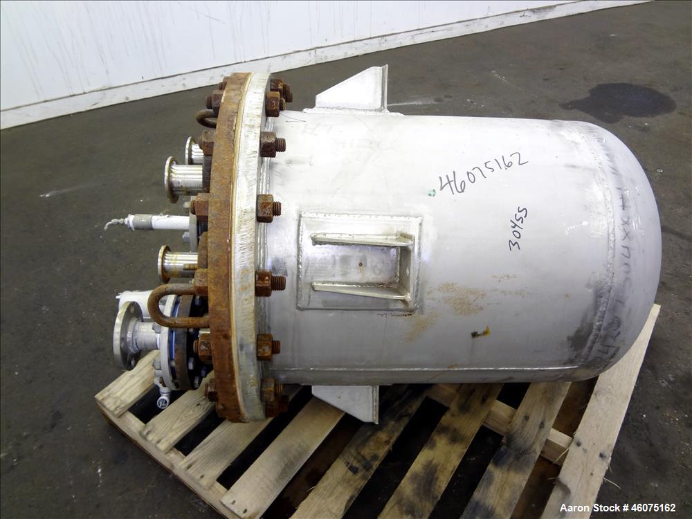 Used Tank, 50 Gallon, 304 Stainless Steel, Vertical. Approximate 24" diameter x 24" straight side, flat bolt top, dished bottom. Top openings: (2) 2", (2) 4", (1) 1-1/2", (1) 1". 3" Center bottom out...