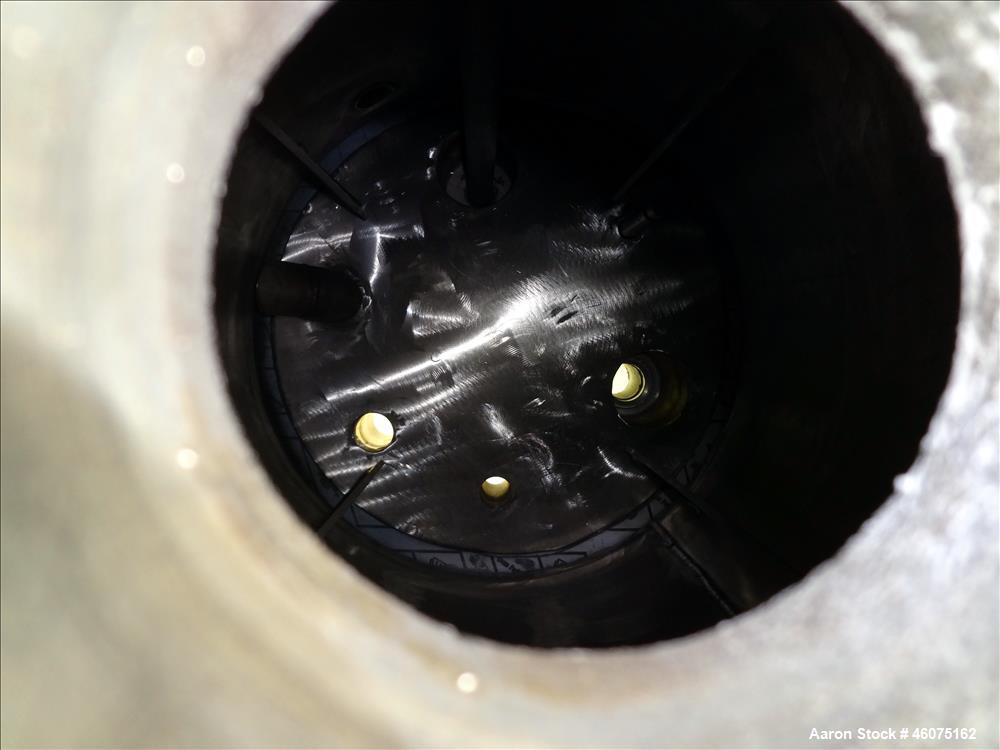 Used Tank, 50 Gallon, 304 Stainless Steel, Vertical. Approximate 24" diameter x 24" straight side, flat bolt top, dished bottom. Top openings: (2) 2", (2) 4", (1) 1-1/2", (1) 1". 3" Center bottom out...