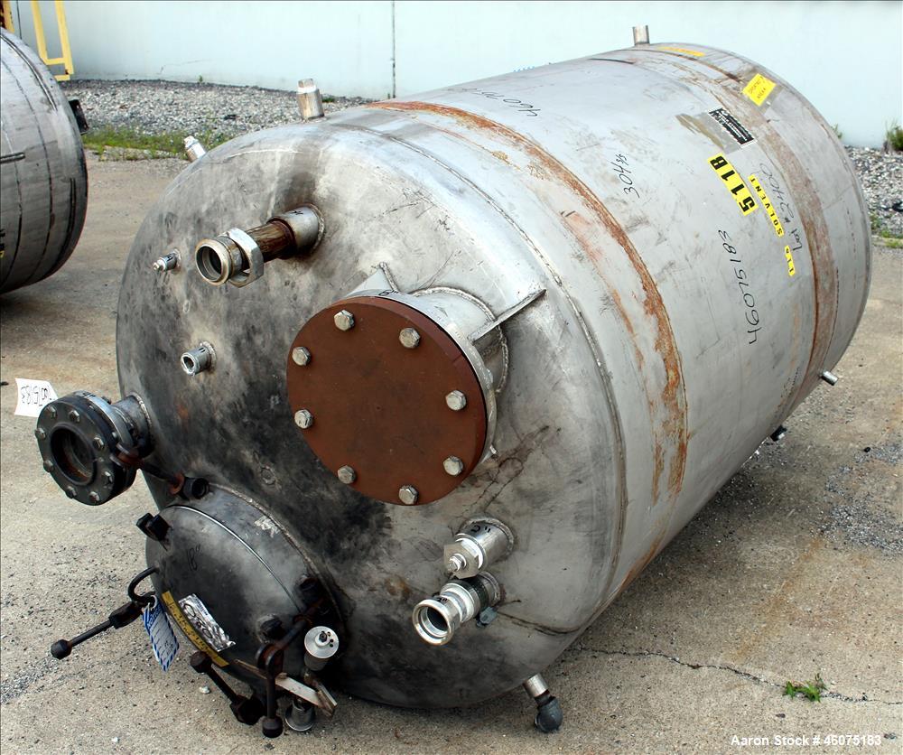 Used Tank, 500 Gallon, 304 Stainless Steel, Vertical. Approximate 48" diameter x 60" straight side, dished top & bottom. Openings top: 16" man way with hinged cover, (1) 4" sight glass, (1) 8", (3) 2...