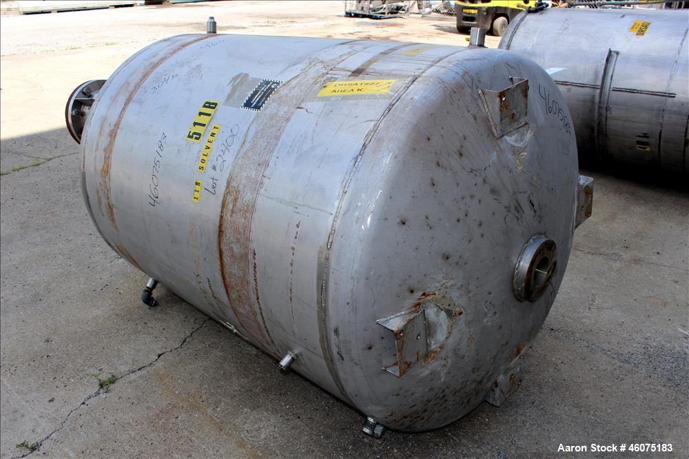 Used Tank, 500 Gallon, 304 Stainless Steel, Vertical. Approximate 48" diameter x 60" straight side, dished top & bottom. Openings top: 16" man way with hinged cover, (1) 4" sight glass, (1) 8", (3) 2...