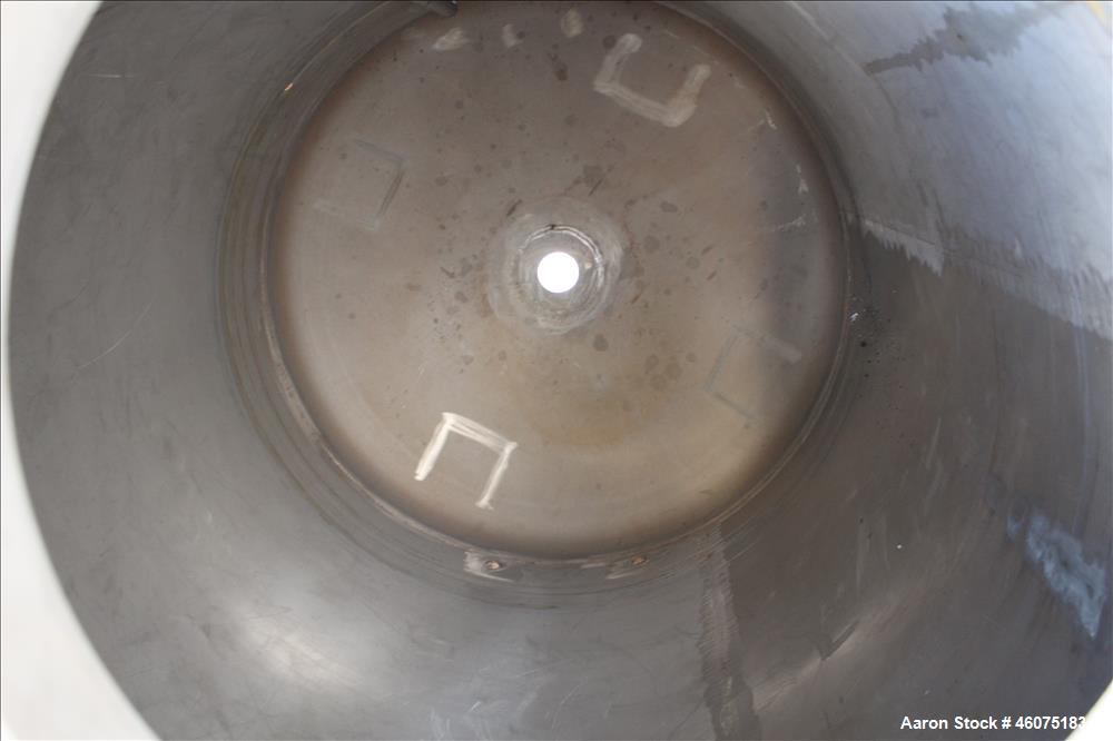 Used Tank, 500 Gallon, 304 Stainless Steel, Vertical. Approximate 48" diameter x 60" straight side, dished top & bottom. Openings top: 16" man way with hinged cover, (1) 4" sight glass, (1) 8", (3) 2...
