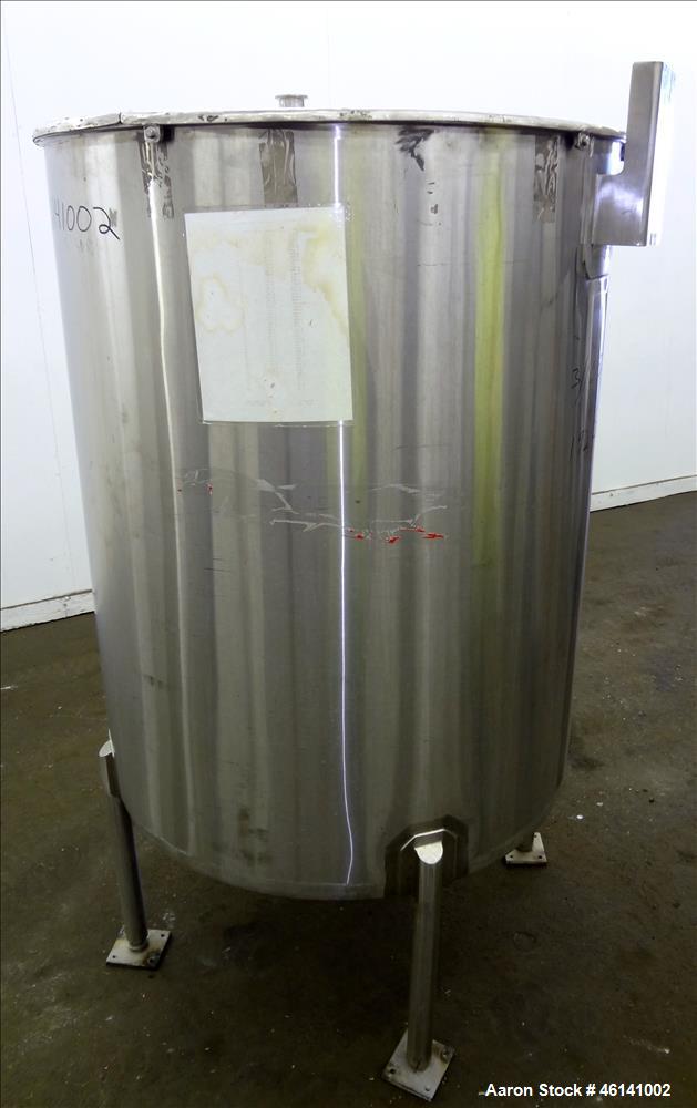 Used Tank, Approximately 250 Gallon, 316 Stainless Steel, Vertical. Flat top with a 1/3 hinged top cover, slight coned bottom. Provision for clamp on agitator (no agitator). Openings top (2) 1-1/2", ...