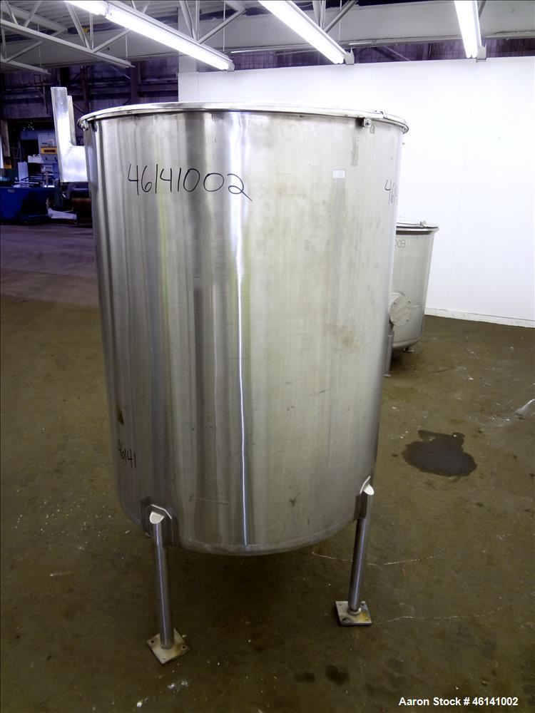 Used Tank, Approximately 250 Gallon, 316 Stainless Steel, Vertical. Flat top with a 1/3 hinged top cover, slight coned bottom. Provision for clamp on agitator (no agitator). Openings top (2) 1-1/2", ...