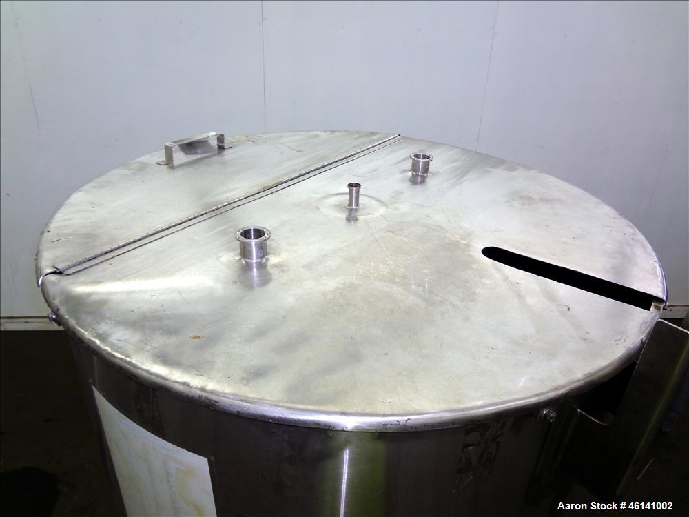 Used Tank, Approximately 250 Gallon, 316 Stainless Steel, Vertical. Flat top with a 1/3 hinged top cover, slight coned bottom. Provision for clamp on agitator (no agitator). Openings top (2) 1-1/2", ...