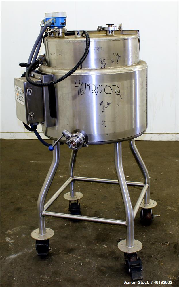 Used Tank, Approximately 30 Gallon, 304 Stainless steel. 23-1/2" Diameter x 16" straight side, insulated. Flat top, sloped bottom. Openings: (4) 2" tri-clamp, hinged top cover; 1-1/2" side bottom out...
