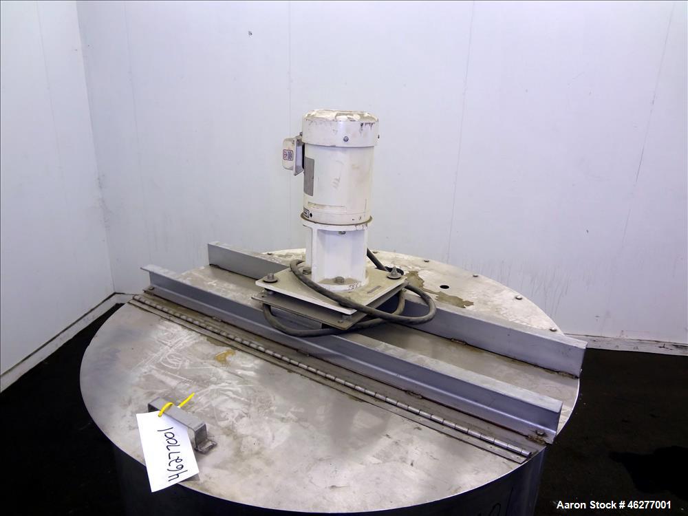 Used Tank, Approximately 320 Gallons, 304 Stainless Steel, Vertical. Approximately 45" diameter x 44" straight side. Flat top, sloped bottom. Carbon steel bridge with Sharpe disperser, model FDP-100,...