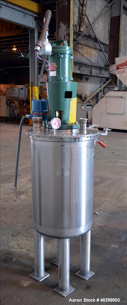 Used Tank, Approximately 40 Gallons, 304 Stainless Steel, Vertical. 20" Diameter x 30" straight side. Bolt-on flat top with 1/4 hinged cover, dished bottom. Top entering Lightnin agitator model XJC-3...