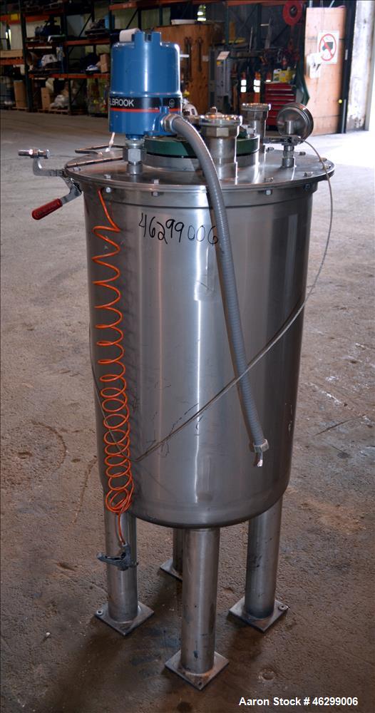 Used Tank, Approximately 40 Gallons, 304 Stainless Steel, Vertical. 20" Diameter x 30" straight side. Bolt-on flat top with 1/4 hinged cover, dished bottom. Top entering agitator (no motor), with 1" ...
