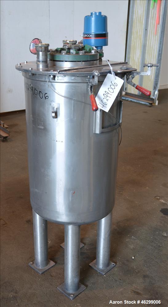 Used Tank, Approximately 40 Gallons, 304 Stainless Steel, Vertical. 20" Diameter x 30" straight side. Bolt-on flat top with 1/4 hinged cover, dished bottom. Top entering agitator (no motor), with 1" ...