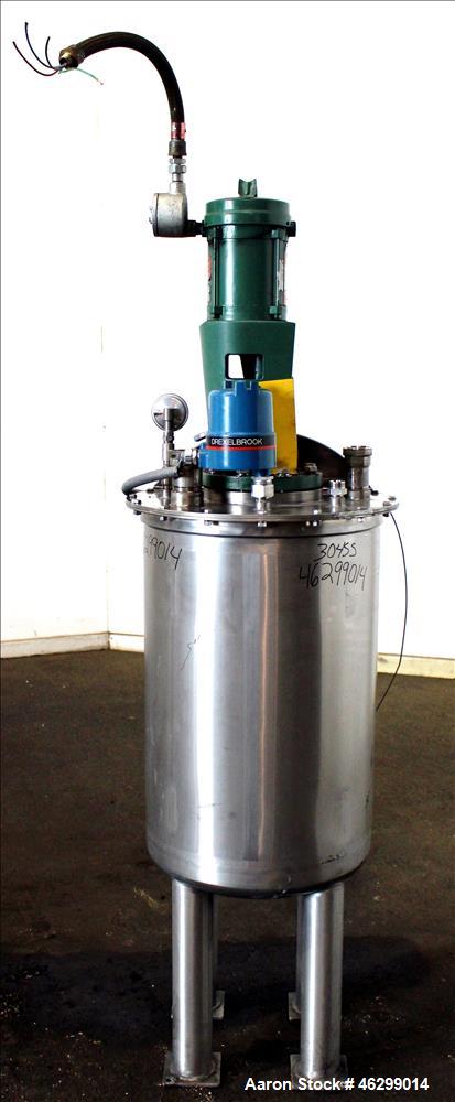 Used Tank, Approximately 40 Gallons, 304 Stainless Steel, Vertical. 20" Diameter x 30" straight side. Bolt-on flat top with 1/4 hinged cover, dished bottom. Top entering Lightnin agitator model XJC-3...