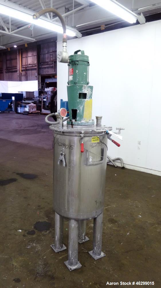 Used Tank, Approximately 40 Gallons, 304 Stainless Steel, Vertical. 20" Diameter x 30" straight side. Bolt-on flat top with 1/4 hinged cover, dished bottom. Top entering Lightnin agitator model XJC-3...