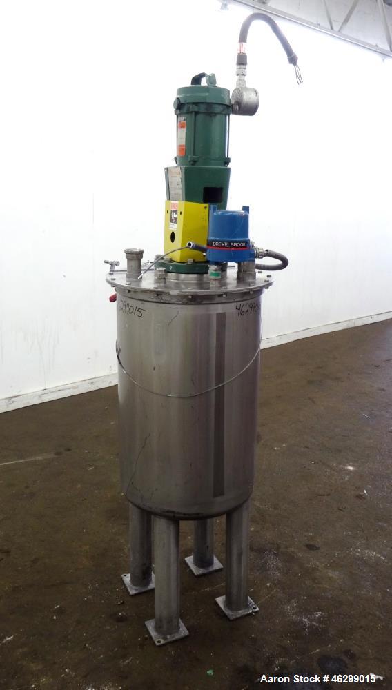 Used Tank, Approximately 40 Gallons, 304 Stainless Steel, Vertical. 20" Diameter x 30" straight side. Bolt-on flat top with 1/4 hinged cover, dished bottom. Top entering Lightnin agitator model XJC-3...