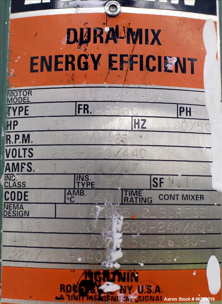 Used Tank, Approximately 40 Gallons, 304 Stainless Steel, Vertical. 20" Diameter x 30" straight side. Bolt-on flat top with 1/4 hinged cover, dished bottom. Top entering Lightnin agitator model XJC-3...