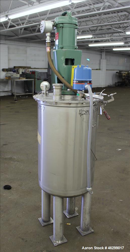 Used Tank, Approximately 40 Gallons, 304 Stainless Steel, Vertical. 20" Diameter x 30" straight side. Bolt-on flat top with 1/4 hinged cover, dished bottom. Top entering Lightnin agitator model XJC-3...
