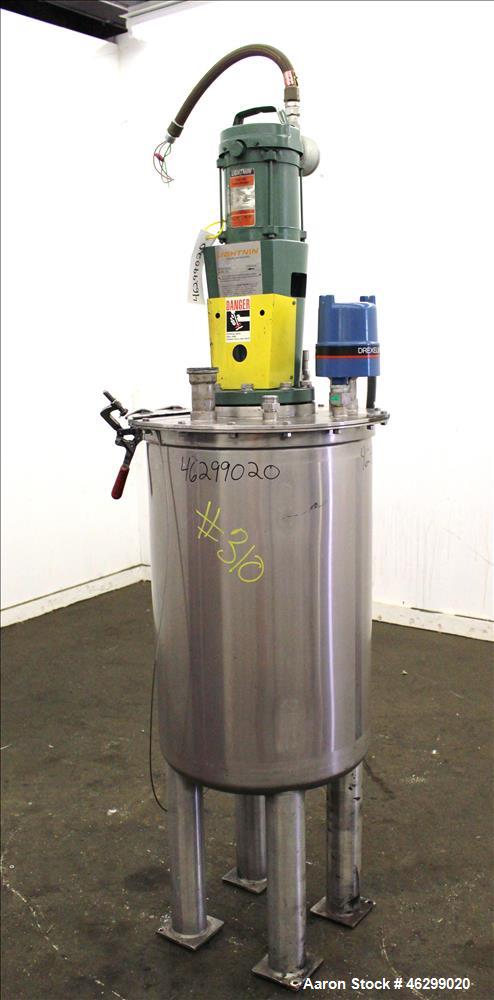 Used Tank, Approximately 40 Gallons, 304 Stainless Steel, Vertical. 20" Diameter x 30" straight side. Bolt-on flat top with 1/4 hinged cover, dished bottom. Top entering Lightnin agitator model XJC-3...