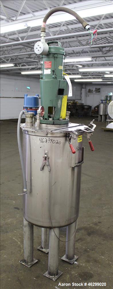 Used Tank, Approximately 40 Gallons, 304 Stainless Steel, Vertical. 20" Diameter x 30" straight side. Bolt-on flat top with 1/4 hinged cover, dished bottom. Top entering Lightnin agitator model XJC-3...
