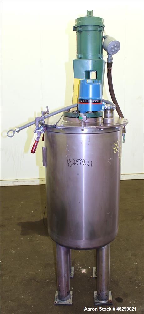 Used Tank, Approximately 40 Gallons, 304 Stainless Steel, Vertical. 20" Diameter x 30" straight side. Bolt-on flat top with 1/4 hinged cover, dished bottom. Top entering Lightnin agitator model XJC-3...