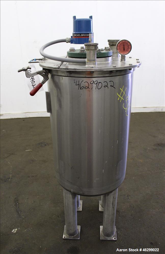 Used Tank, Approximately 40 Gallons, 304 Stainless Steel, Vertical. 20" Diameter x 30" straight side. Bolt-on flat top with 1/4 hinged cover, dished bottom. Top entering agitator (no motor), with 1" ...