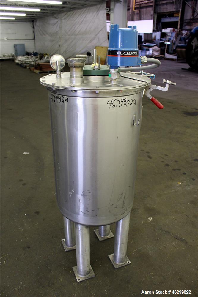 Used Tank, Approximately 40 Gallons, 304 Stainless Steel, Vertical. 20" Diameter x 30" straight side. Bolt-on flat top with 1/4 hinged cover, dished bottom. Top entering agitator (no motor), with 1" ...