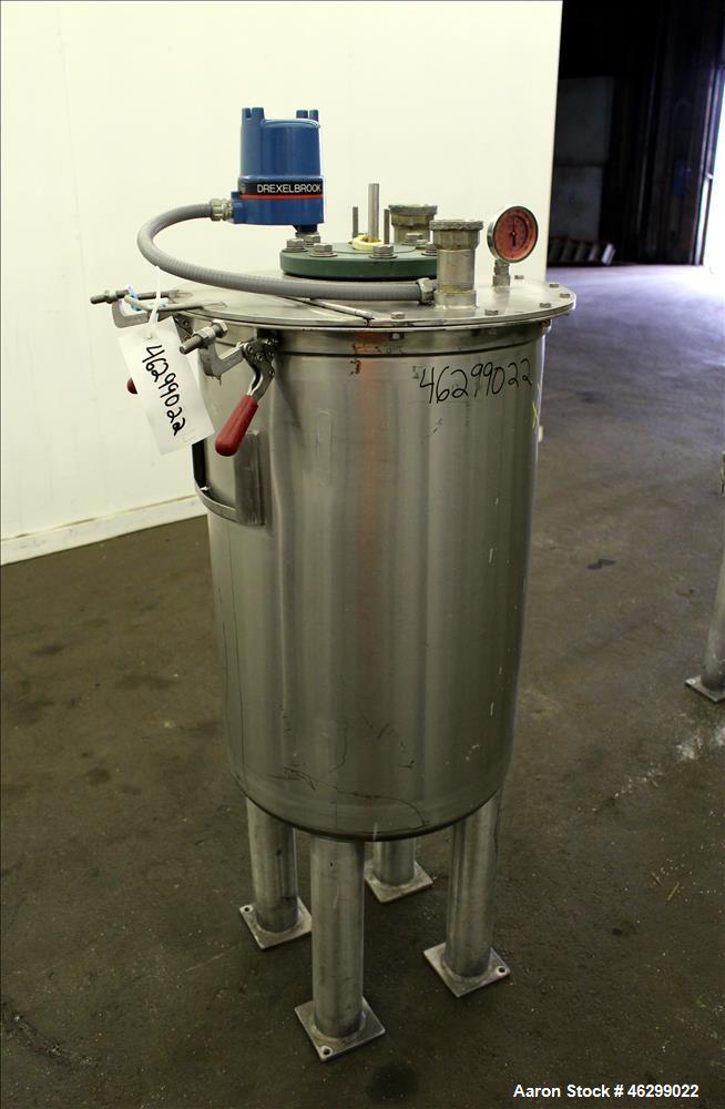 Used Tank, Approximately 40 Gallons, 304 Stainless Steel, Vertical. 20" Diameter x 30" straight side. Bolt-on flat top with 1/4 hinged cover, dished bottom. Top entering agitator (no motor), with 1" ...