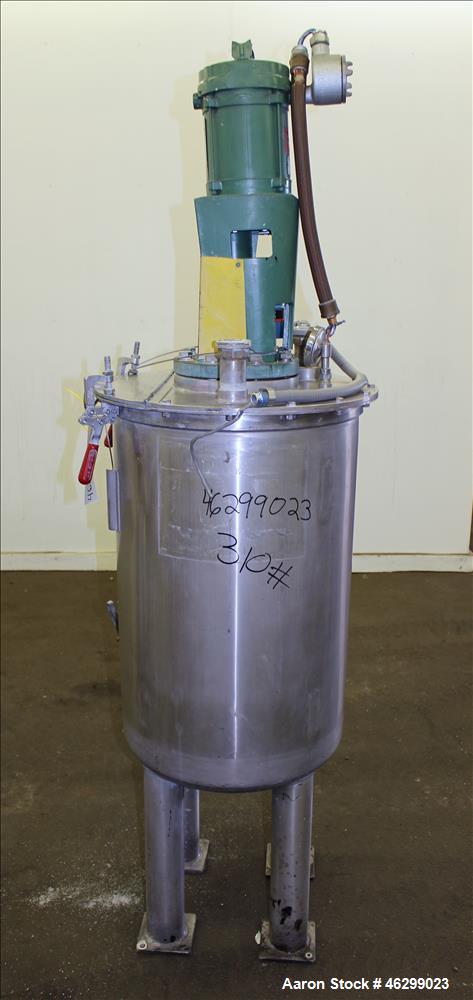 Used Tank, Approximately 40 Gallons, 304 Stainless Steel, Vertical. 20" Diameter x 30" straight side. Bolt-on flat top with 1/4 hinged cover, dished bottom. Top entering Lightnin agitator model XJC-3...