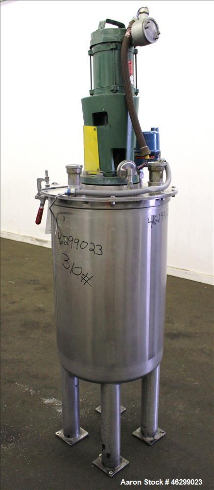 Used Tank, Approximately 40 Gallons, 304 Stainless Steel, Vertical. 20" Diameter x 30" straight side. Bolt-on flat top with 1/4 hinged cover, dished bottom. Top entering Lightnin agitator model XJC-3...