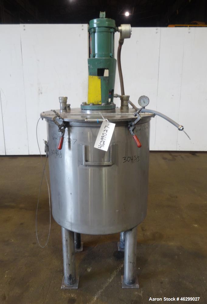Used Tank, Approximately 80 Gallons, 304 Stainless Steel, Vertical. 30" Diameter x 28" straight side. Bolt-on flat top with 1/3 hinged cover, dished bottom. Top entering Lightnin agitator model XJC-3...