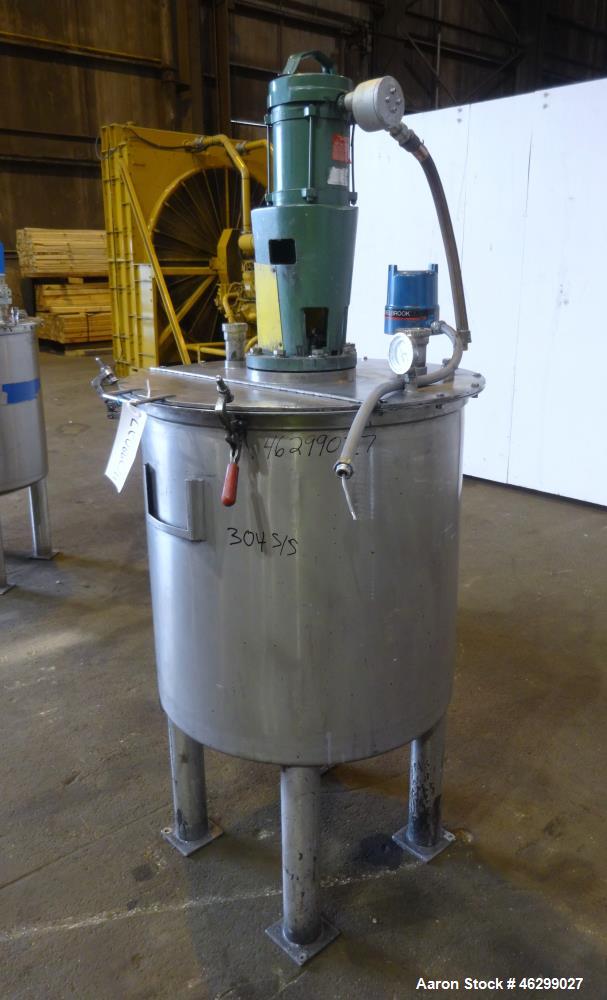Used Tank, Approximately 80 Gallons, 304 Stainless Steel, Vertical. 30" Diameter x 28" straight side. Bolt-on flat top with 1/3 hinged cover, dished bottom. Top entering Lightnin agitator model XJC-3...