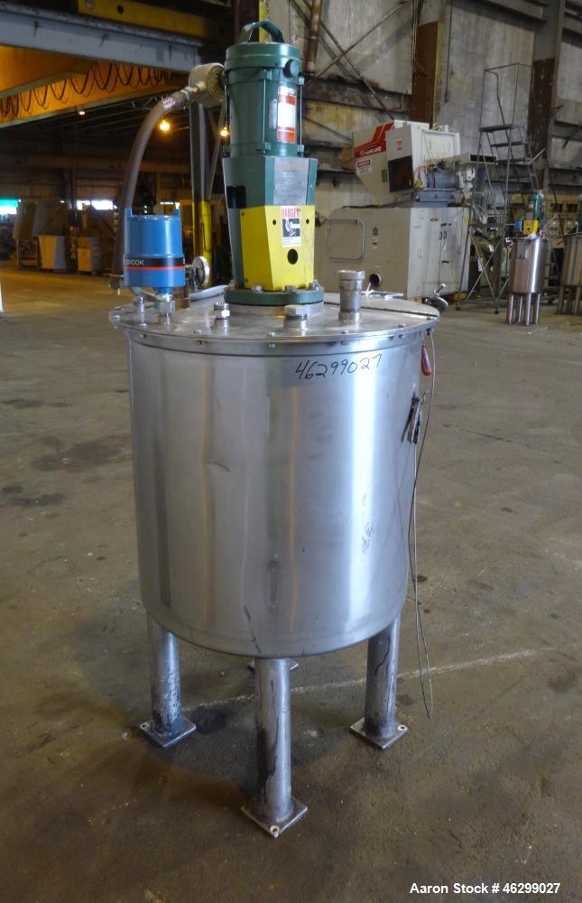 Used Tank, Approximately 80 Gallons, 304 Stainless Steel, Vertical. 30" Diameter x 28" straight side. Bolt-on flat top with 1/3 hinged cover, dished bottom. Top entering Lightnin agitator model XJC-3...