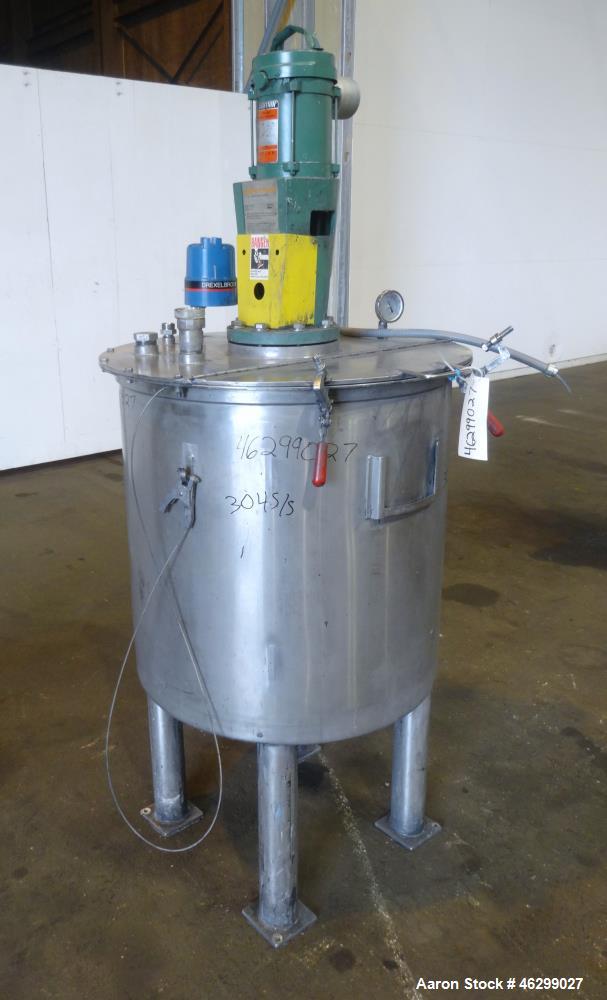 Used Tank, Approximately 80 Gallons, 304 Stainless Steel, Vertical. 30" Diameter x 28" straight side. Bolt-on flat top with 1/3 hinged cover, dished bottom. Top entering Lightnin agitator model XJC-3...