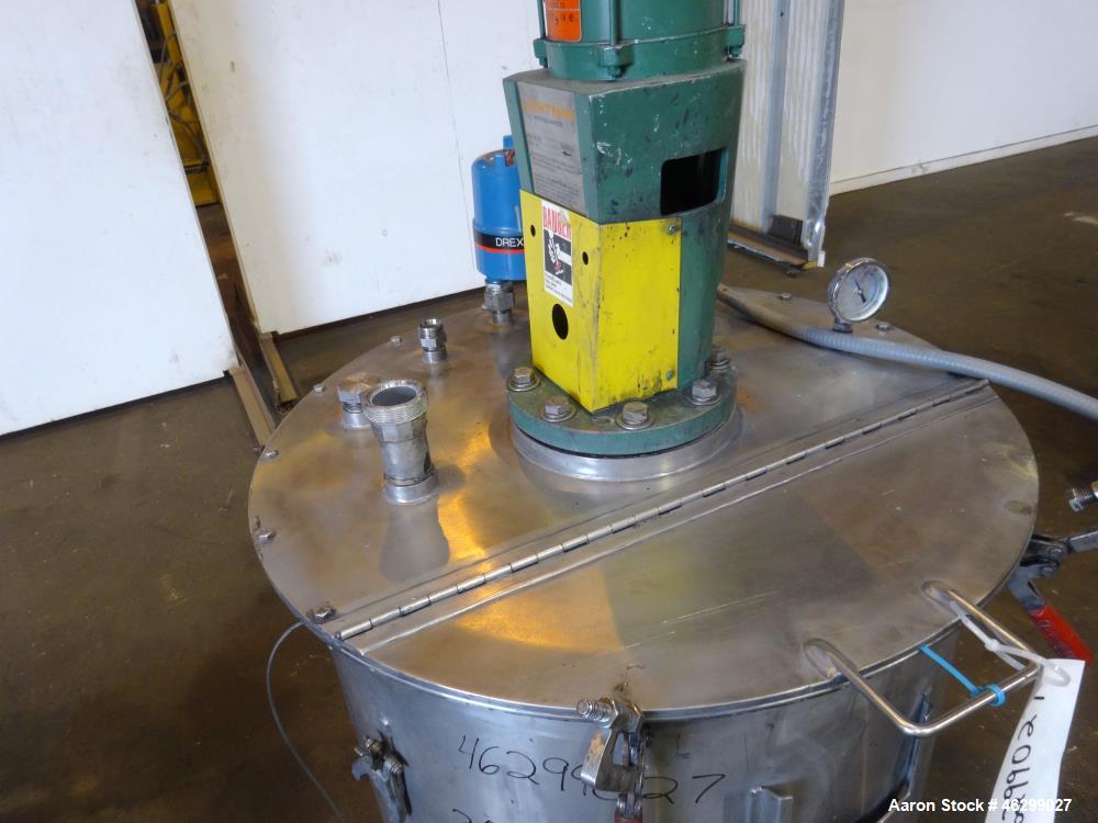 Used Tank, Approximately 80 Gallons, 304 Stainless Steel, Vertical. 30" Diameter x 28" straight side. Bolt-on flat top with 1/3 hinged cover, dished bottom. Top entering Lightnin agitator model XJC-3...