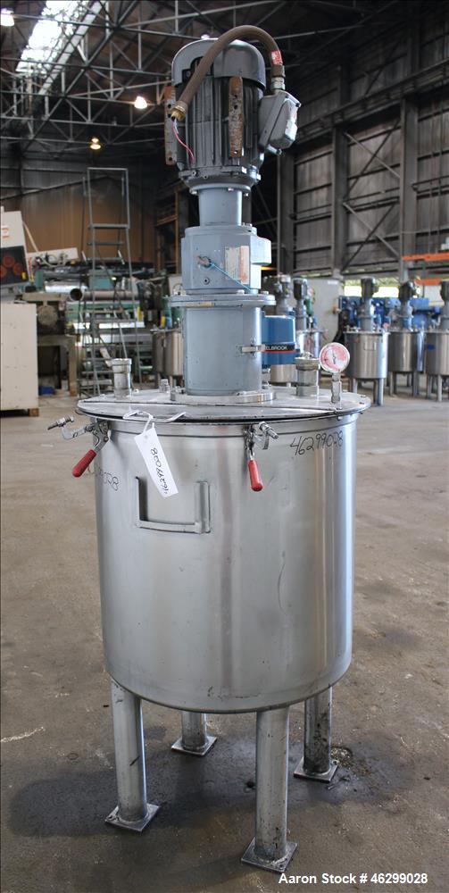 Used Tank, Approximately 80 Gallons, 304 Stainless Steel, Vertical. 30" Diameter x 28" straight side. Bolt-on flat top with 1/3 hinged cover, dished bottom. Top entering agitator, with 2" diameter sh...