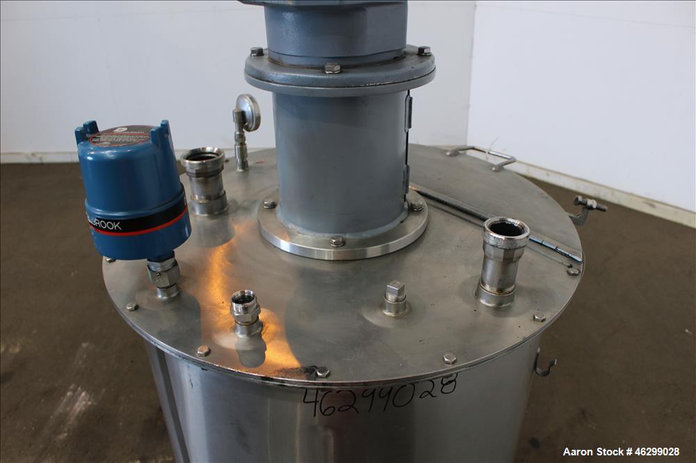 Used Tank, Approximately 80 Gallons, 304 Stainless Steel, Vertical. 30" Diameter x 28" straight side. Bolt-on flat top with 1/3 hinged cover, dished bottom. Top entering agitator, with 2" diameter sh...