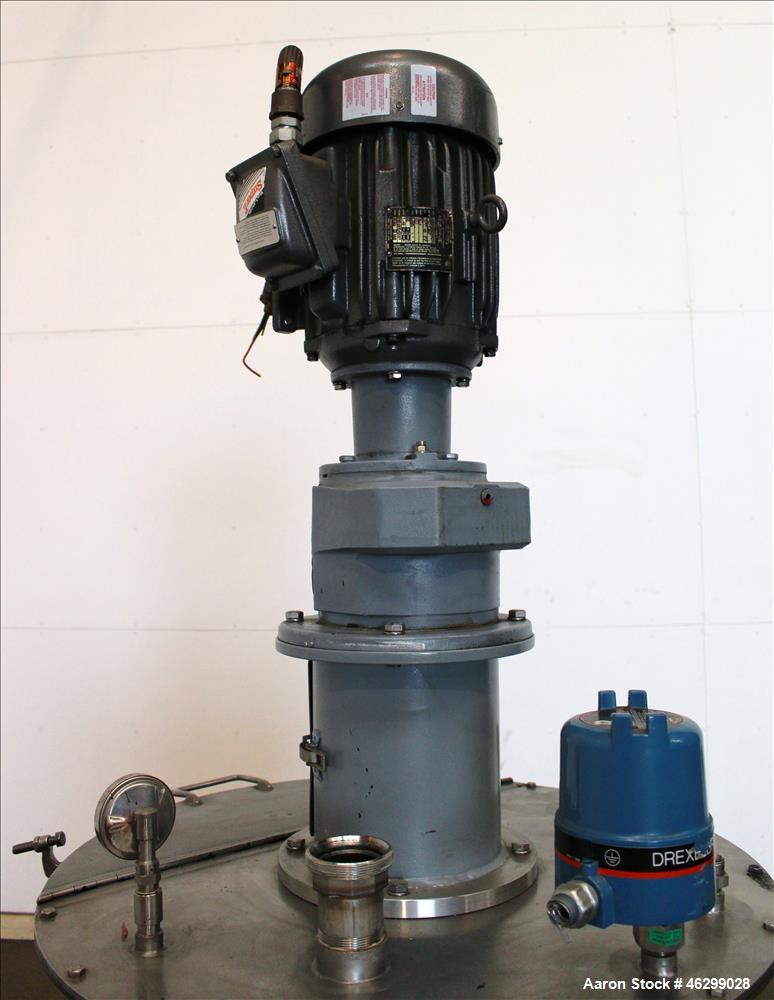 Used Tank, Approximately 80 Gallons, 304 Stainless Steel, Vertical. 30" Diameter x 28" straight side. Bolt-on flat top with 1/3 hinged cover, dished bottom. Top entering agitator, with 2" diameter sh...