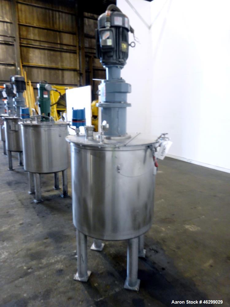 Used Tank, Approximately 80 Gallons, 304 Stainless Steel, Vertical. 30" Diameter x 28" straight side. Bolt-on flat top with 1/3 hinged cover, dished bottom. Top entering agitator, with 2" diameter sh...