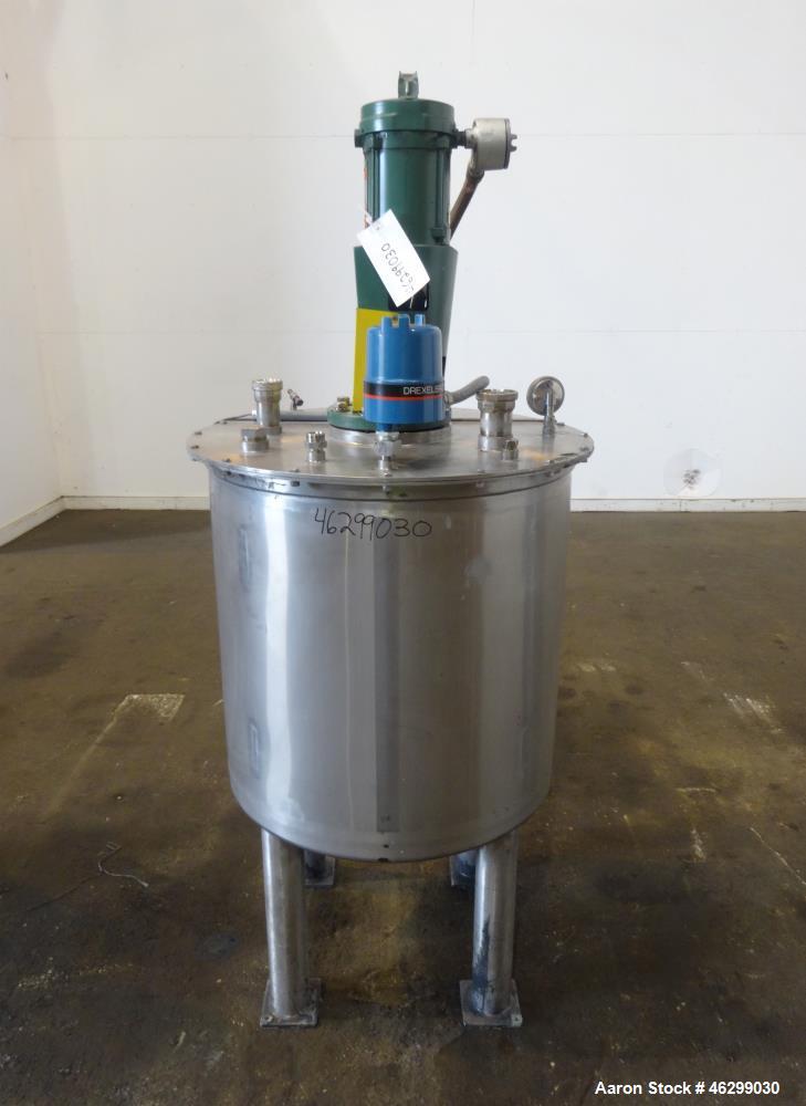 Used Tank, Approximately 80 Gallons, 304 Stainless Steel, Vertical. 30" Diameter x 28" straight side. Bolt-on flat top with 1/3 hinged cover, dished bottom. Top entering Lightnin agitator model XJC-3...