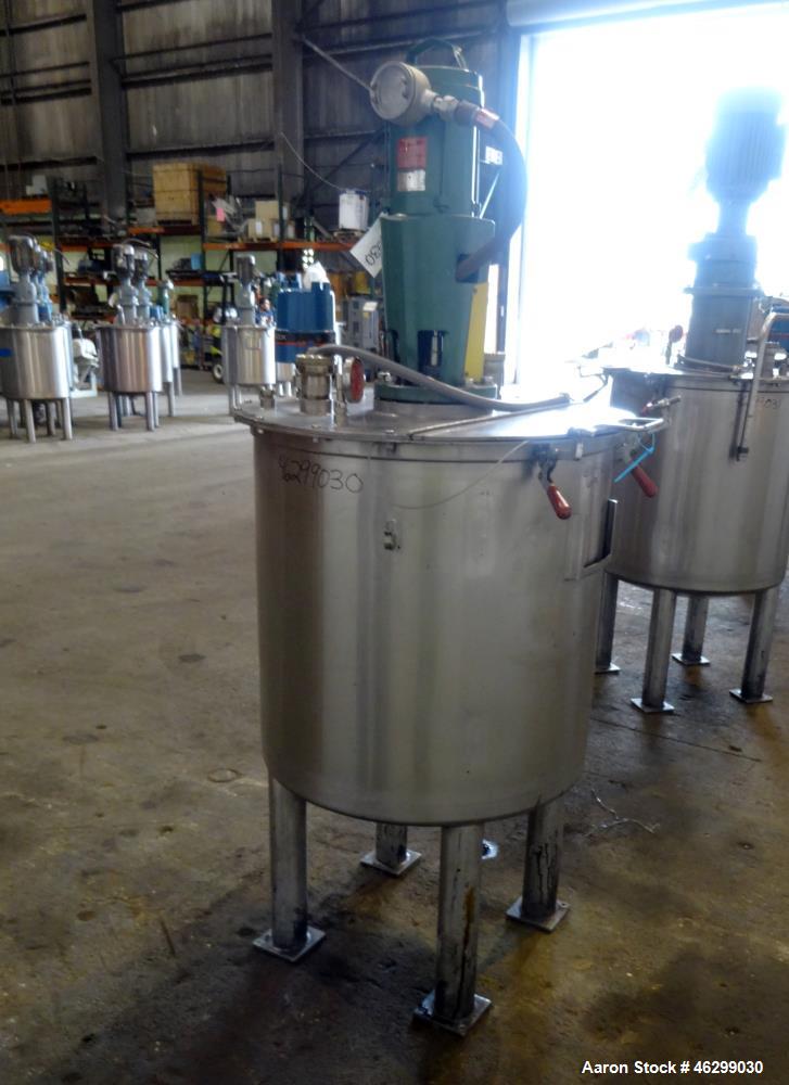 Used Tank, Approximately 80 Gallons, 304 Stainless Steel, Vertical. 30" Diameter x 28" straight side. Bolt-on flat top with 1/3 hinged cover, dished bottom. Top entering Lightnin agitator model XJC-3...